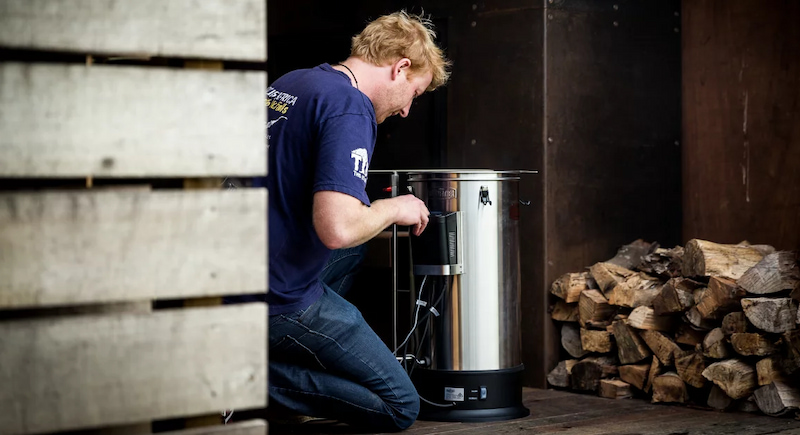 Man making beer with grainfather