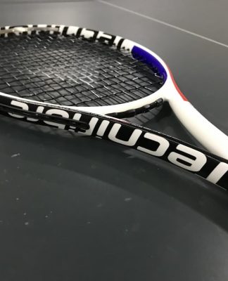 Tennis racquet on the tennis court