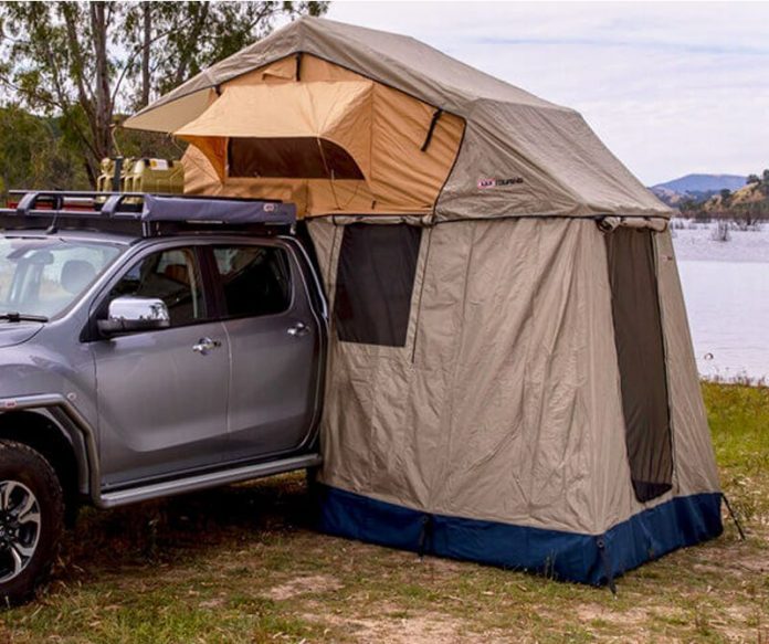 Car camping 2 man tent next to a lake